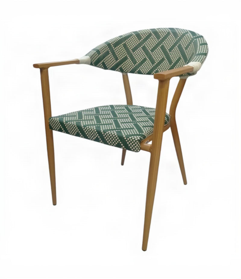 Chair with green patterned cushion on a white background